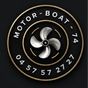 A circular black and gold emblem featuring a silver propeller in the center, with the words “MOTOR BOAT” and the number “04 57 57 27 27” on a dark background.